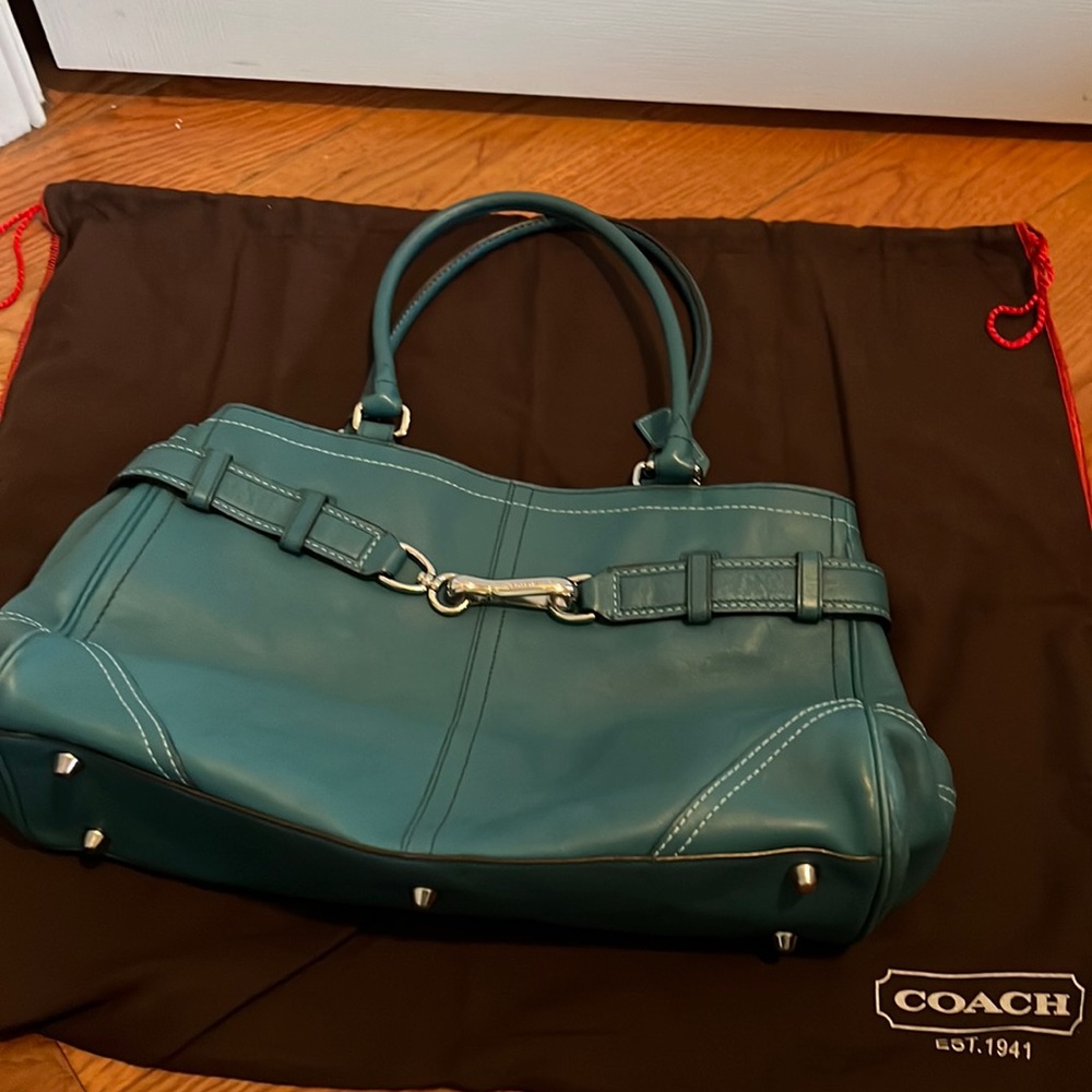 1391 Great condition like new Coach turquoise leather bag